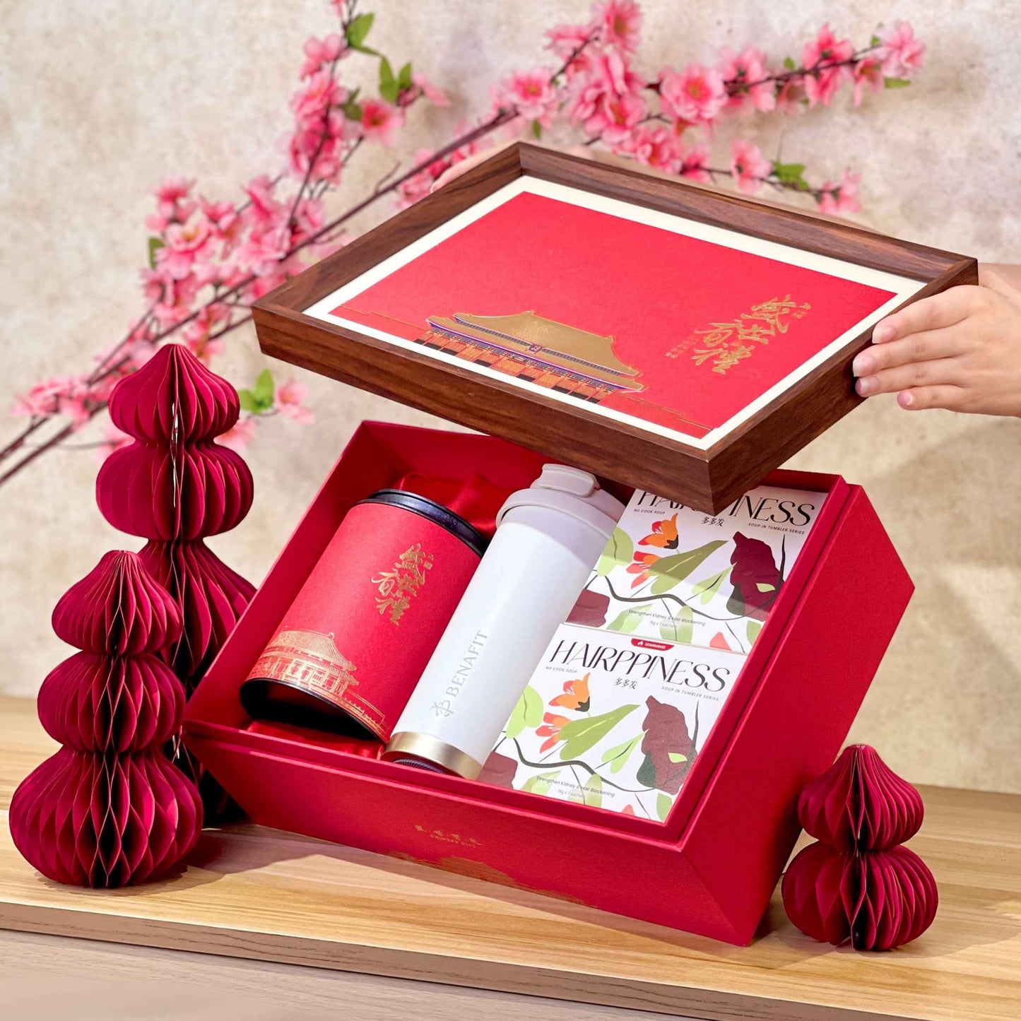 benafit no cook soup Red gift box with a mug, 2 box of no cook soup, and XL sized red dates with cherry blossoms in the background.